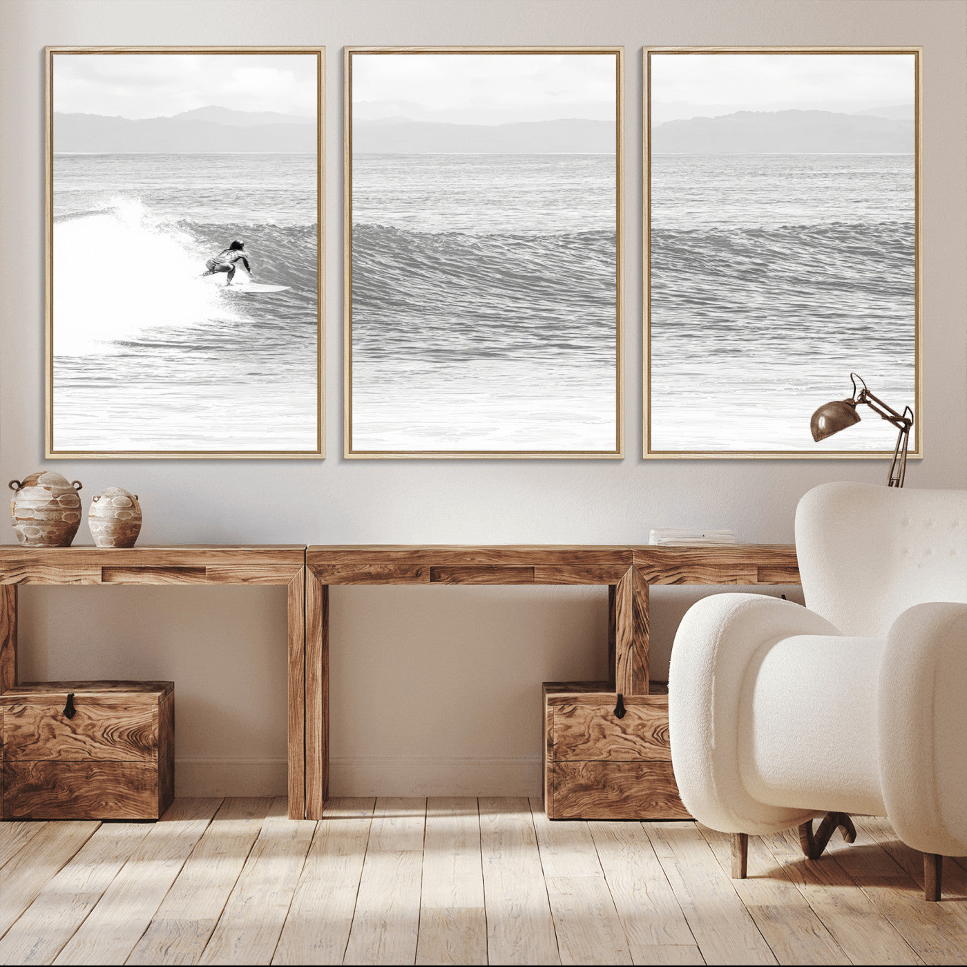 Monochrome photo of a surfer riding a wave with distant mountains, ideal for coastal motion or black and white surf-themed wall decor.