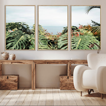 Monstera leaves and tropical flowers framing a calm ocean view, ideal for tropical coastal or exotic jungle-style interior wall decor.