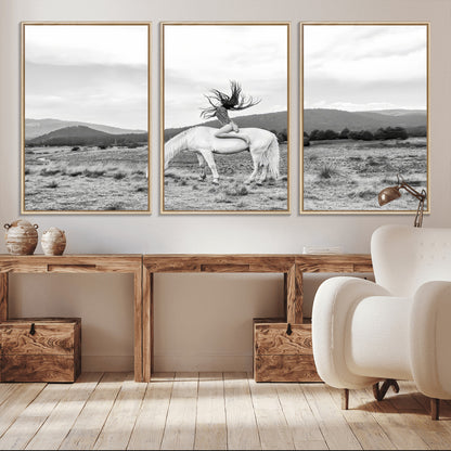 Black and white photo of a woman on a white horse in moody tones, ideal for Western Boho or modern rustic-style home decor.