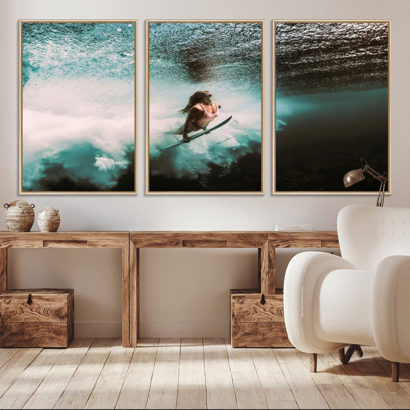 Vibrant underwater photo of a female surfer diving through turquoise waves, perfect for coastal boho or surf-inspired home decor.