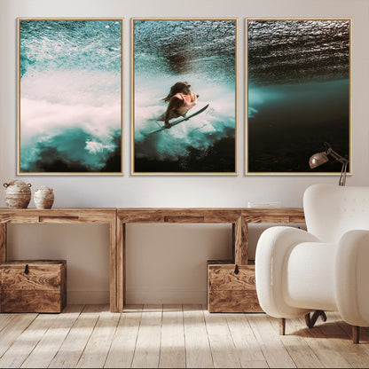 Vibrant underwater photo of a female surfer diving through turquoise waves, perfect for coastal boho or surf-inspired home decor.