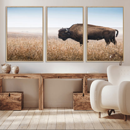 A majestic bison standing in an open prairie field, its strong form blending into the golden grass under a vast blue sky, evoking the wild spirit of the American plains.