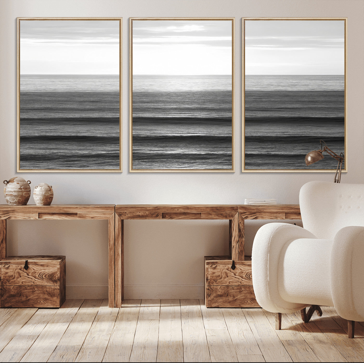 Minimalist black and white ocean view with layered waves reflecting sunlight, evoking a sense of calm and coastal serenity.