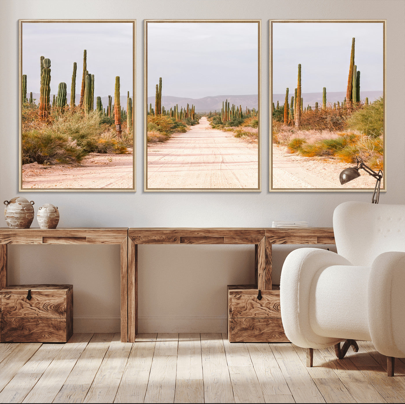 A desert road lined with saguaro cacti under a golden sky, creating a warm southwestern feel, perfect for boho or rustic decor.
