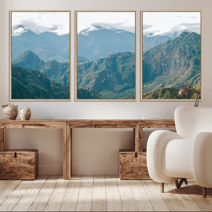 A misty mountain landscape with cloud-covered Andean peaks and lush green valleys, creating a dramatic and serene view, perfect for rustic or nature-inspired home decor.