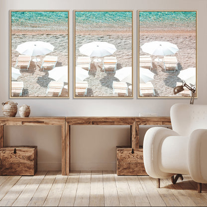 A bright beach scene with white umbrellas, pastel sand, and turquoise waters, creating a tranquil coastal vibe, perfect for beach house or summer decor.