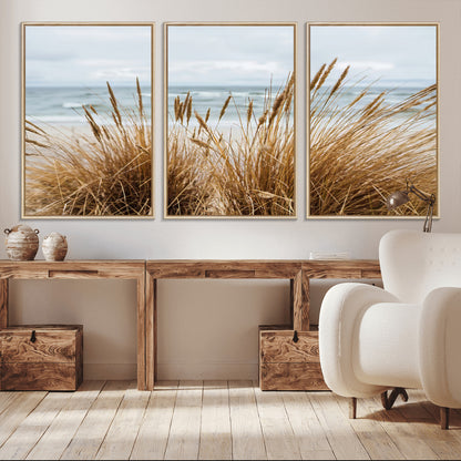 Canvas of golden beach grass swaying by the ocean under a soft cloudy sky, perfect for neutral-toned or coastal minimalist decor.