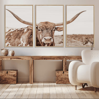 A longhorn cow in soft beige desert tones, standing calmly in open land, perfect for neutral western or rustic farmhouse interiors.