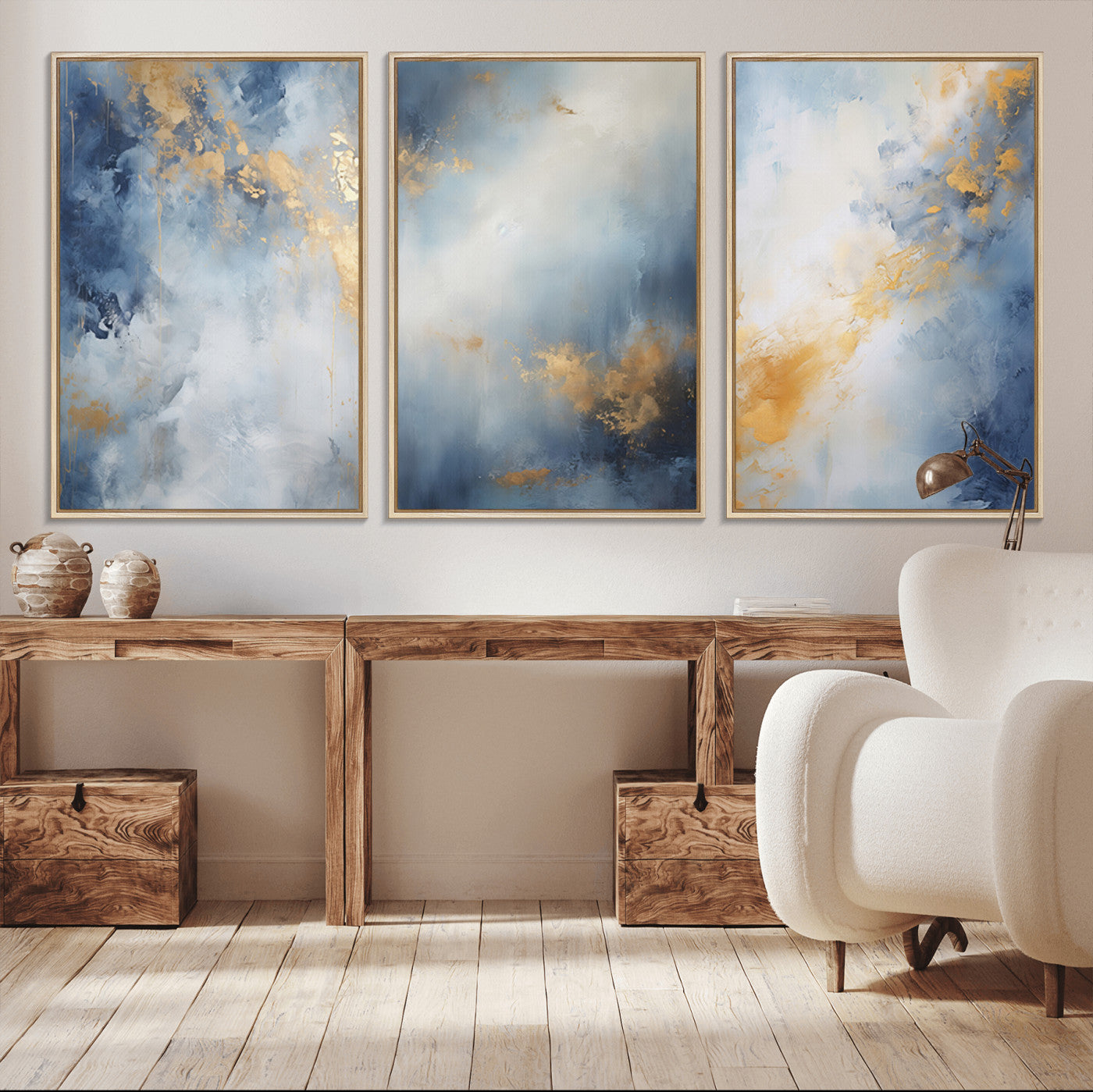 Abstract canvas art in soft blue and gold tones with textured brushstrokes, ideal for elegant or modern neutral decor spaces.