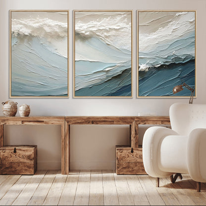 Textured canvas of ocean waves in soft coastal blues and creamy whites, ideal for modern or minimalist coastal-style interiors.