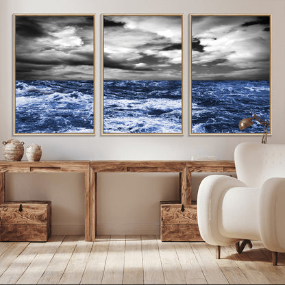 Moody canvas wall art of a stormy ocean under a dramatic black-and-white sky, perfect for bold or coastal-style interiors.
