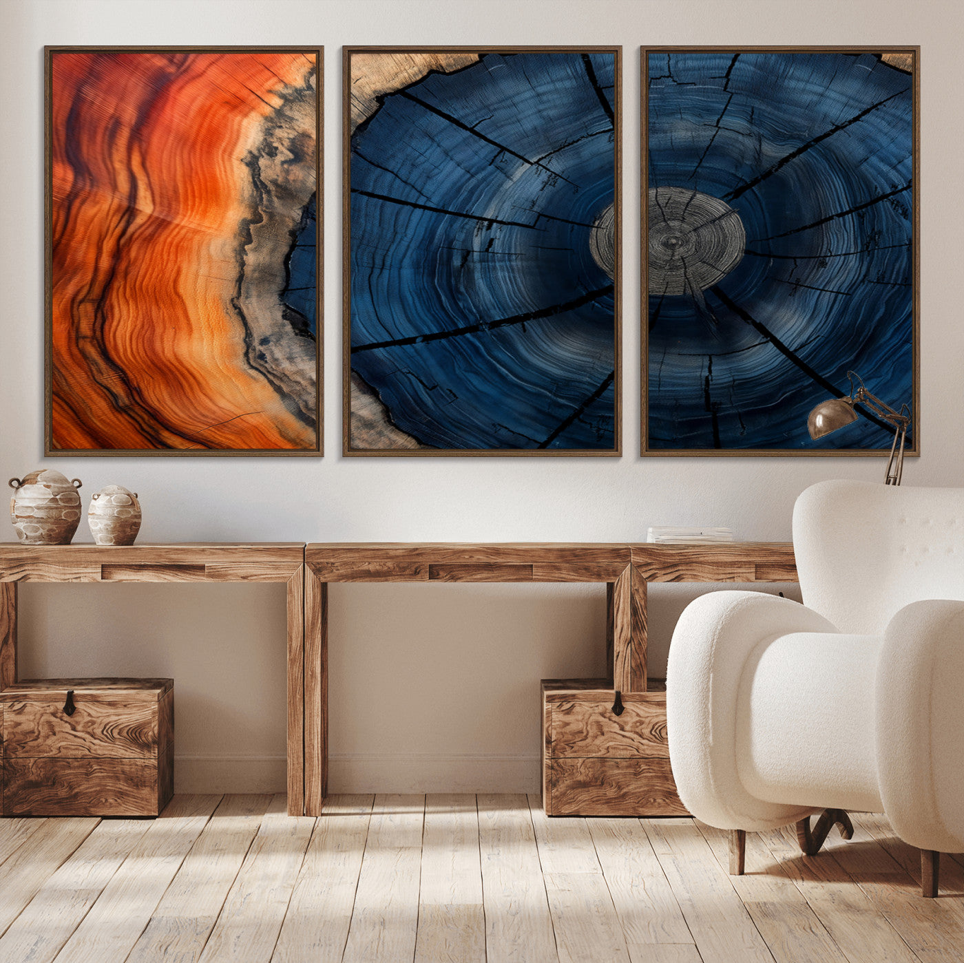 A captivating close-up of a tree trunk, showcasing its concentric rings in rich shades of blue, orange, and brown, highlighting the organic patterns of natural wood.