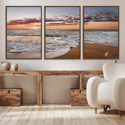Canvas of a sunset over a foamy ocean shore with warm light and gentle waves, ideal for coastal or beach-themed home decor.