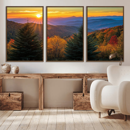 Vibrant sunset over autumn mountains with colorful trees and warm light, ideal for nature lovers or cabin-style wall decor.