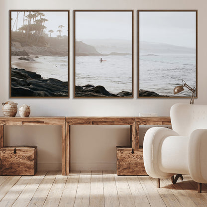 Framed canvas of a surfer in misty coastal tones at a foggy California beach, ideal for minimalist coastal beach or serene ocean-themed decor.