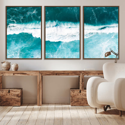 Aerial view of turquoise ocean waves crashing with white foam, perfect for tropical coastal or modern beach-style home decor.