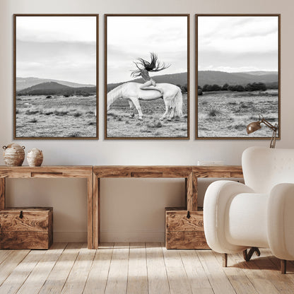 Black and white photo of a woman on a white horse in moody tones, ideal for Western Boho or modern rustic-style home decor.