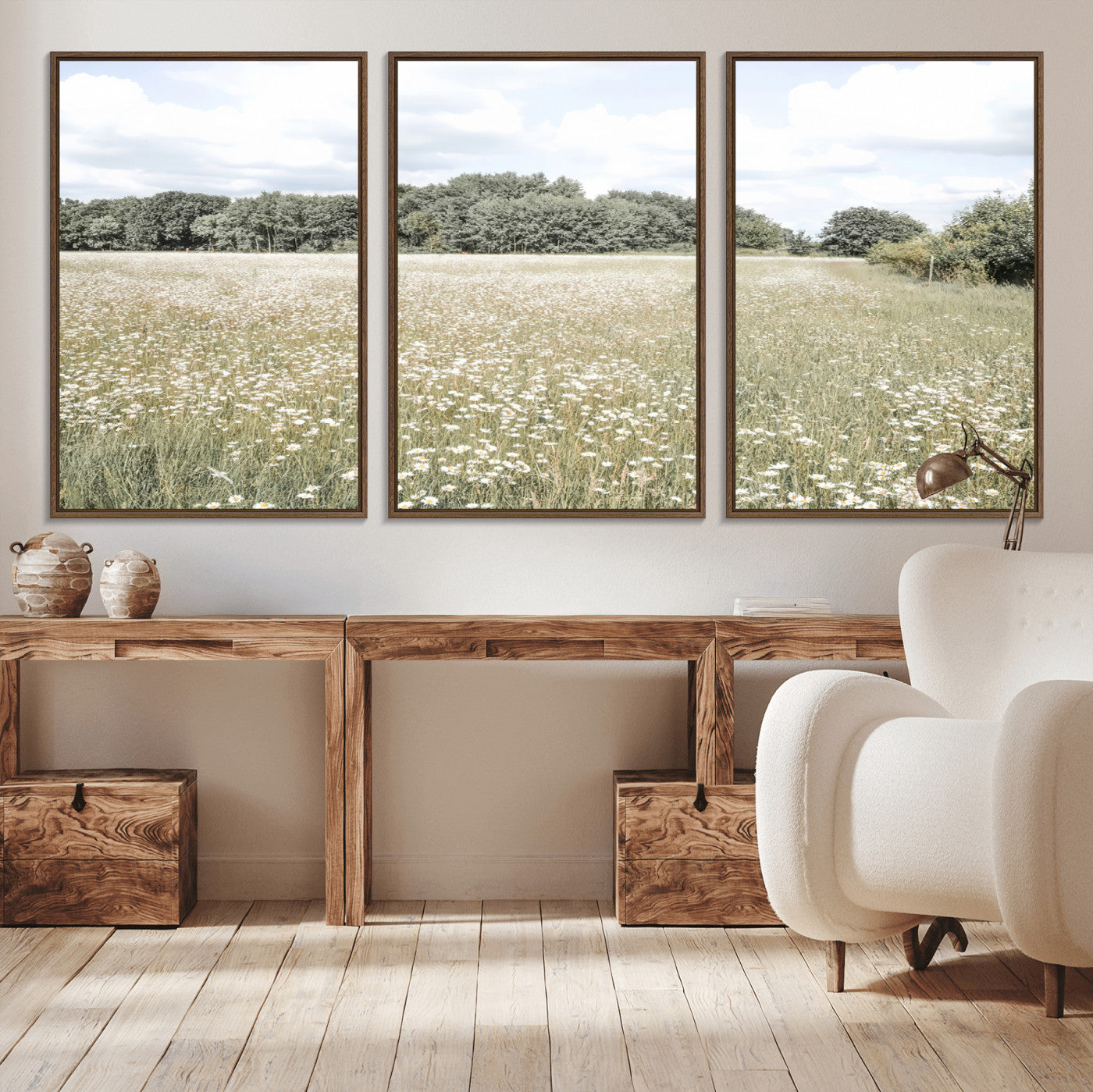 Soft-toned image of a wild daisy field under a cloudy sky, ideal for neutral or Scandinavian-inspired home decor.