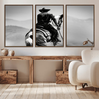 Black and white canvas of a cowboy on horseback with moody tones, perfect for rustic western or country-inspired home decor.