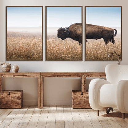 A majestic bison standing in an open prairie field, its strong form blending into the golden grass under a vast blue sky, evoking the wild spirit of the American plains.