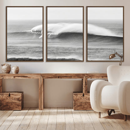 A dramatic black and white ocean wave crashing with immense force, capturing the raw power and movement of the sea in a bold seascape.