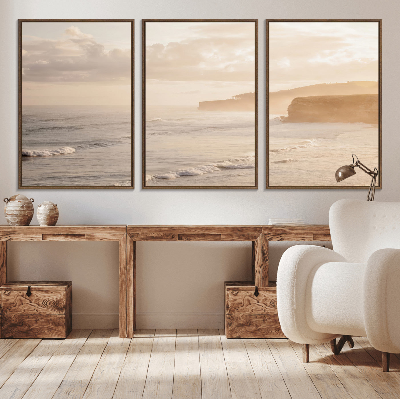 Golden hour seascape with misty cliffs and gentle waves rolling towards the shore, capturing a tranquil and warm coastal atmosphere.