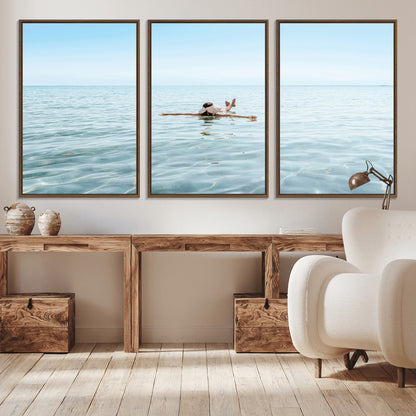 A peaceful minimalist scene of a person floating on crystal-clear water, surrounded by a vast open horizon, capturing relaxation and serenity in a tranquil aquatic setting.