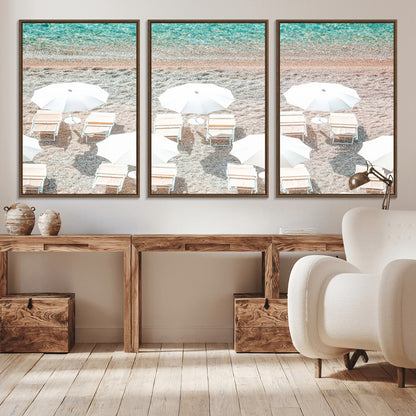 A bright beach scene with white umbrellas, pastel sand, and turquoise waters, creating a tranquil coastal vibe, perfect for beach house or summer decor.