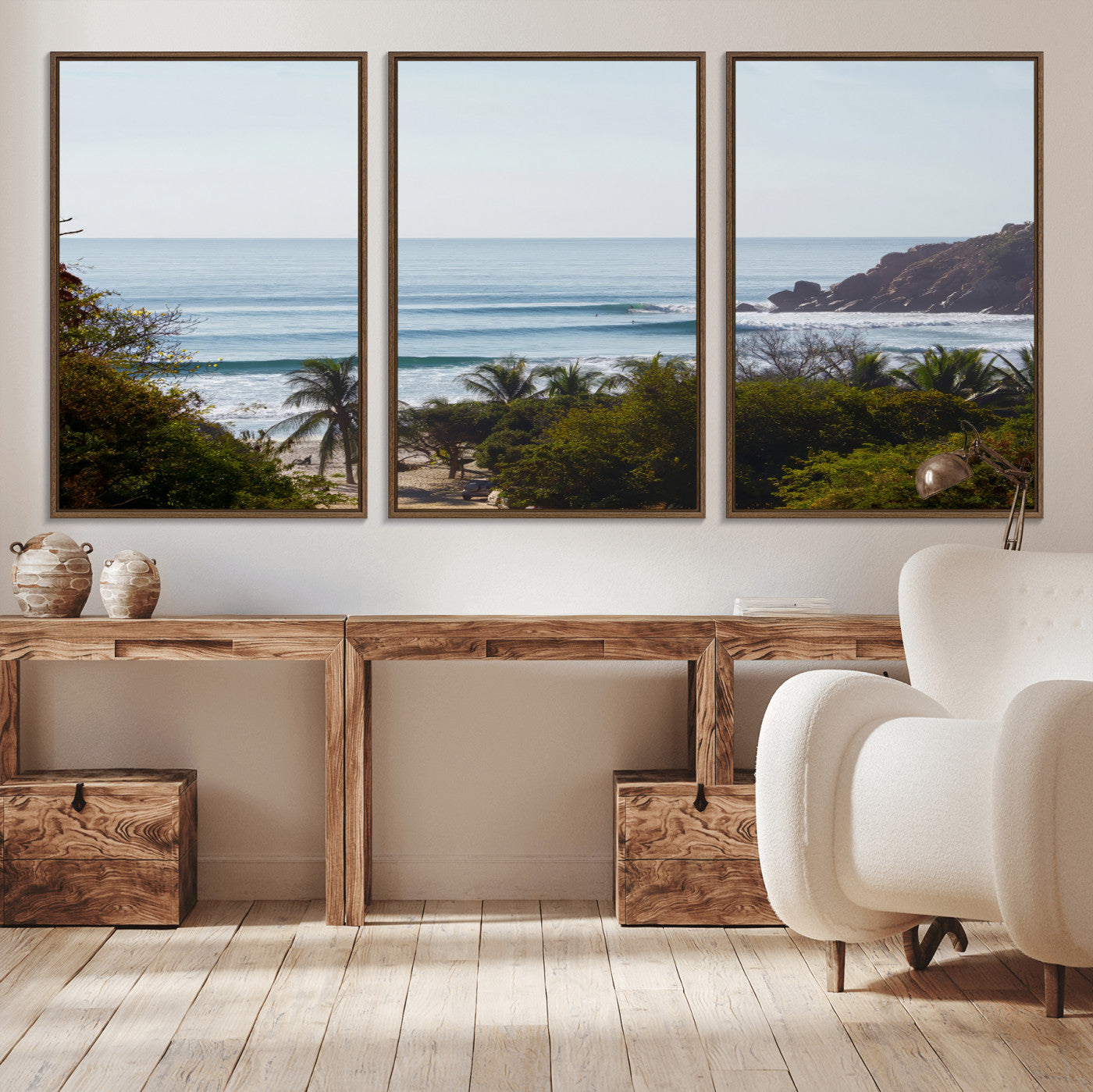 View of calm ocean waves with palm trees and a tropical coastline, ideal for coastal boho or beach-themed wall decor.