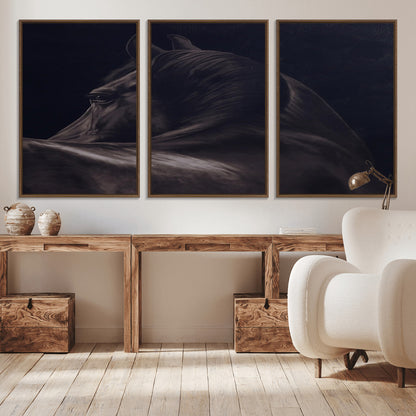 Close-up of a black horse with dramatic lighting on a dark background, perfect for rustic or masculine home decor.