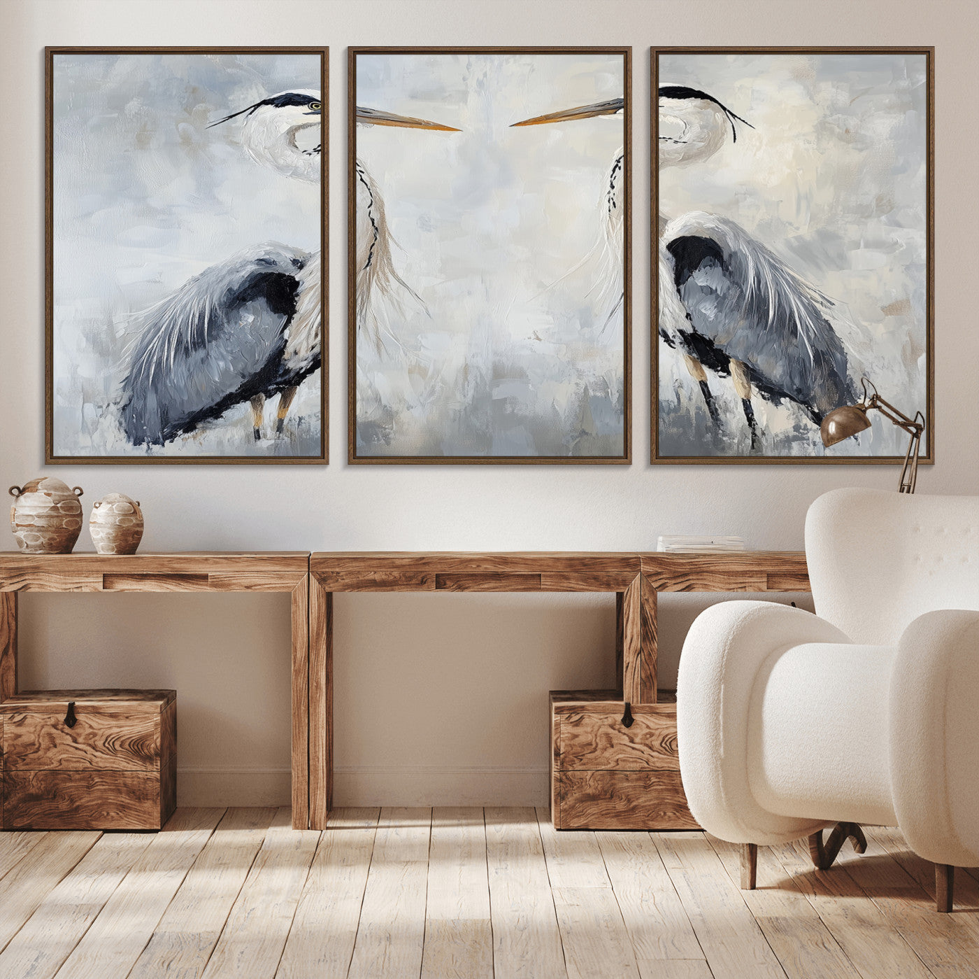 Two herons facing each other on a soft-toned background with blue-grey feathers, perfect for tranquil, coastal or nature-themed interiors.