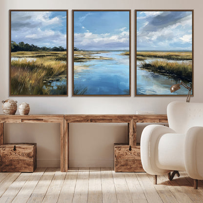 A beautiful, painterly landscape of a calm river winding through a marsh, with vibrant green grasses and a bright blue sky filled with fluffy clouds.