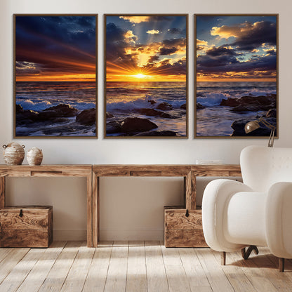 An explosive sunset over the ocean with dramatic clouds and rays of sunlight reflecting off the water, creating a vibrant and captivating view.