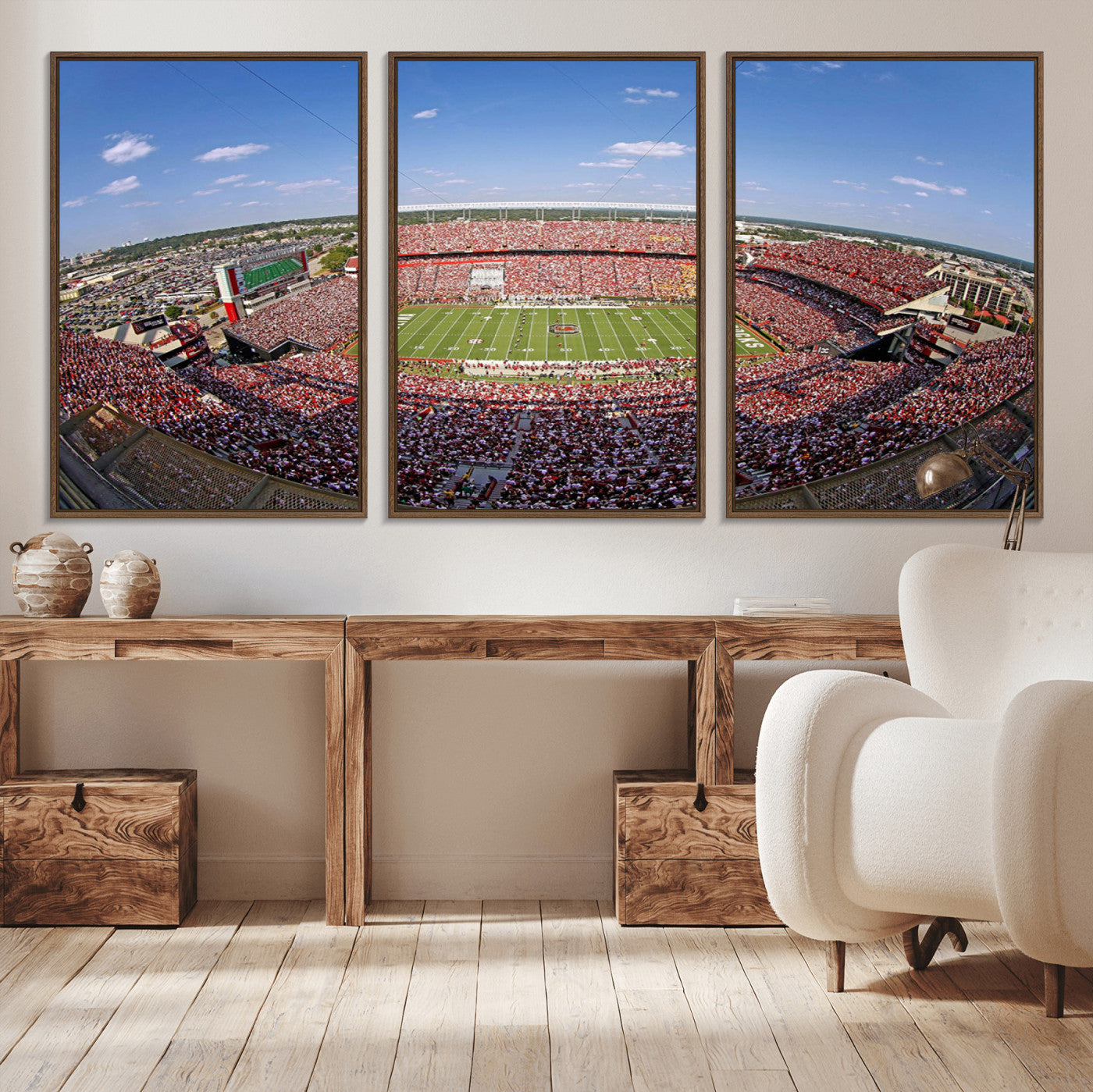 An William Brice-Stadium view of a full football stadium with cheering fans and clear blue skies, capturing the excitement and energy of the game.