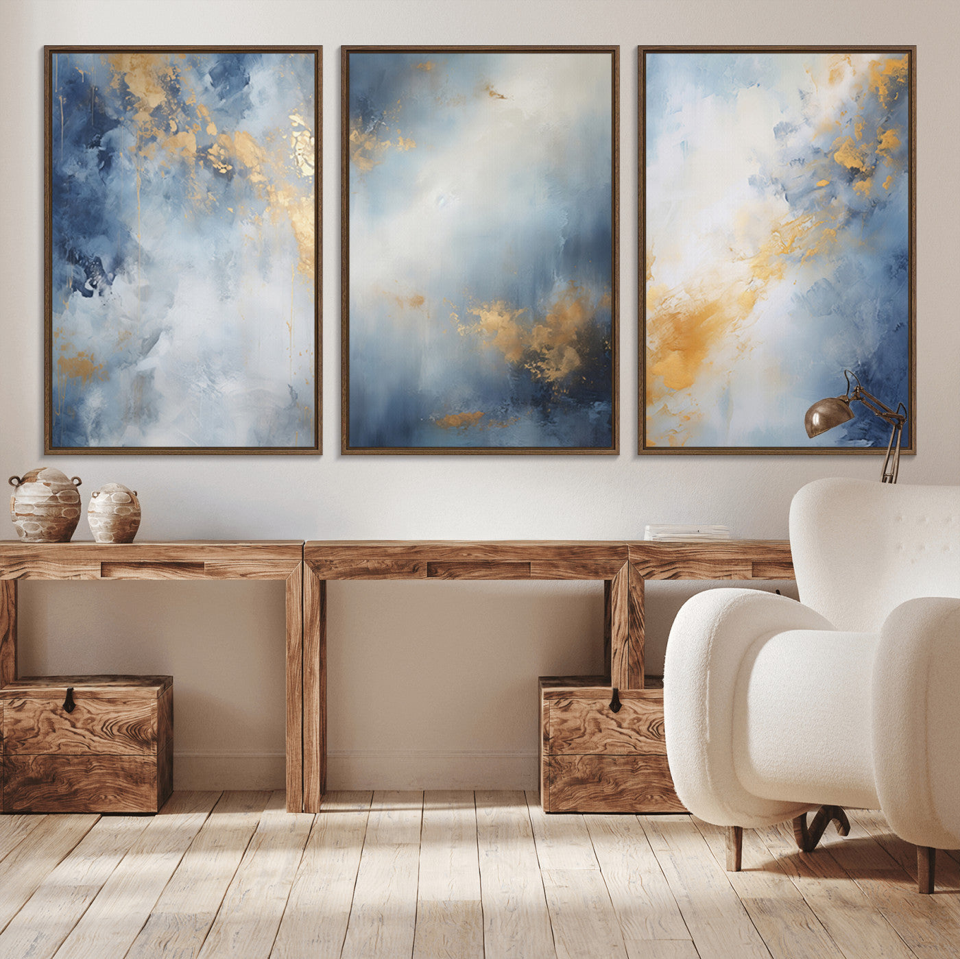 Abstract canvas art in soft blue and gold tones with textured brushstrokes, ideal for elegant or modern neutral decor spaces.