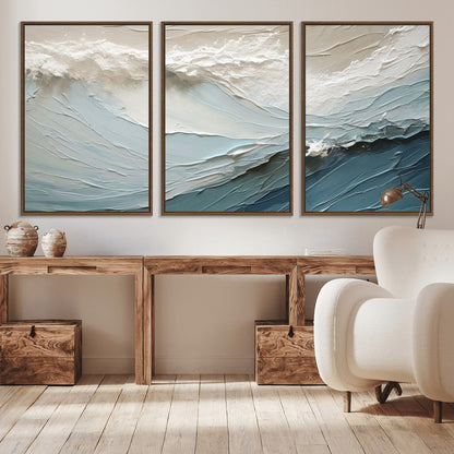 Textured canvas of ocean waves in soft coastal blues and creamy whites, ideal for modern or minimalist coastal-style interiors.
