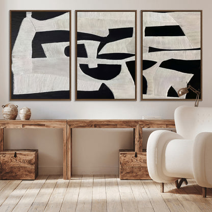 Minimalist black and white canvas featuring bold abstract textures and geometric shapes, ideal for modern neutral decor.