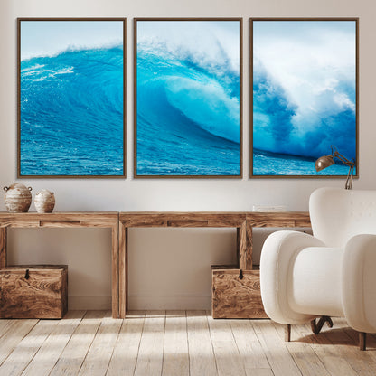 Vibrant canvas of a powerful curling ocean wave in tropical blue tones, perfect for coastal or surf-inspired decor settings.