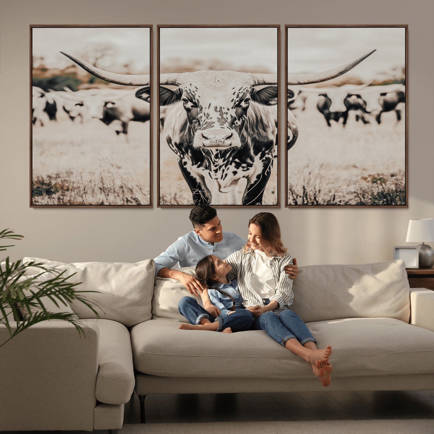 Canvas of a speckled Texas longhorn standing boldly in a field with a herd behind, perfect for rustic western or farmhouse wall decor.