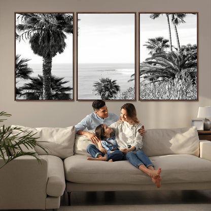 Monochrome canvas of palm trees framing a coastal surf scene, perfect for California-inspired or retro black-and-white beach decor.