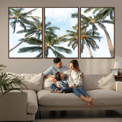 Framed canvas of tall palm trees reaching into a tropical sky, ideal for beach home or relaxed island-inspired wall decor.