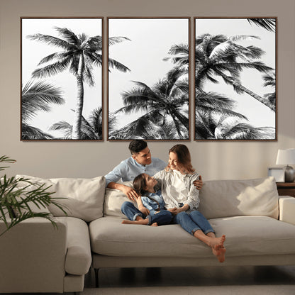 Black and white canvas of tall palm trees in moody tones, perfect for modern tropical minimalist or coastal-style home decor.