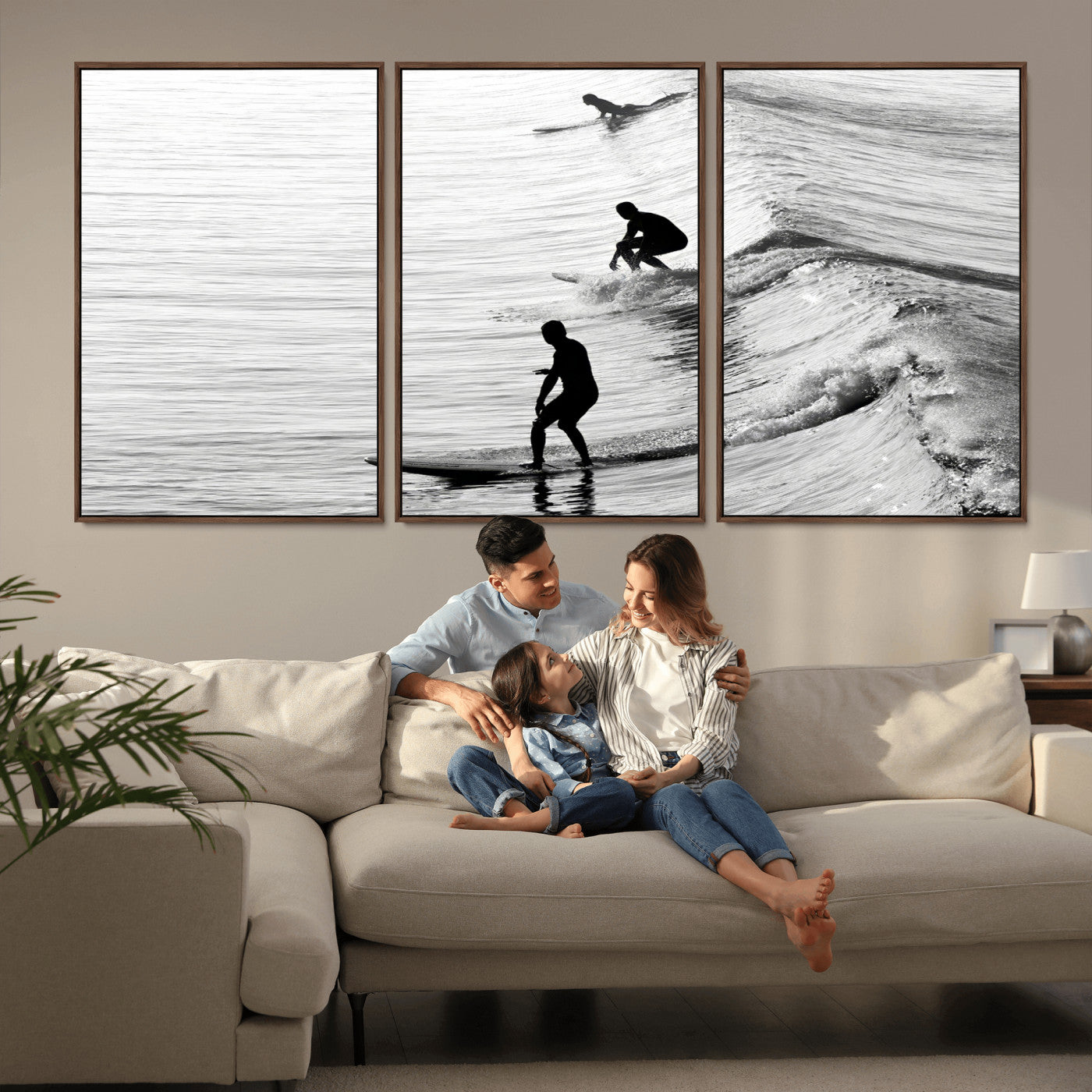 Black and white photo of surfers riding waves in a moody, high-contrast scene, ideal for modern coastal or surf-inspired home decor.