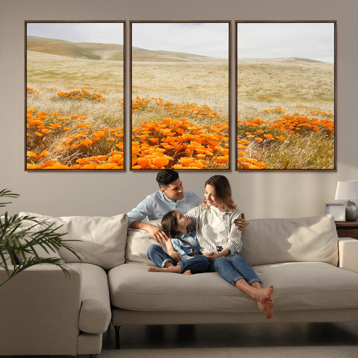 A golden field with vibrant orange poppies blooming across rolling hills under a soft, sunlit sky, creating a warm and rustic landscape.