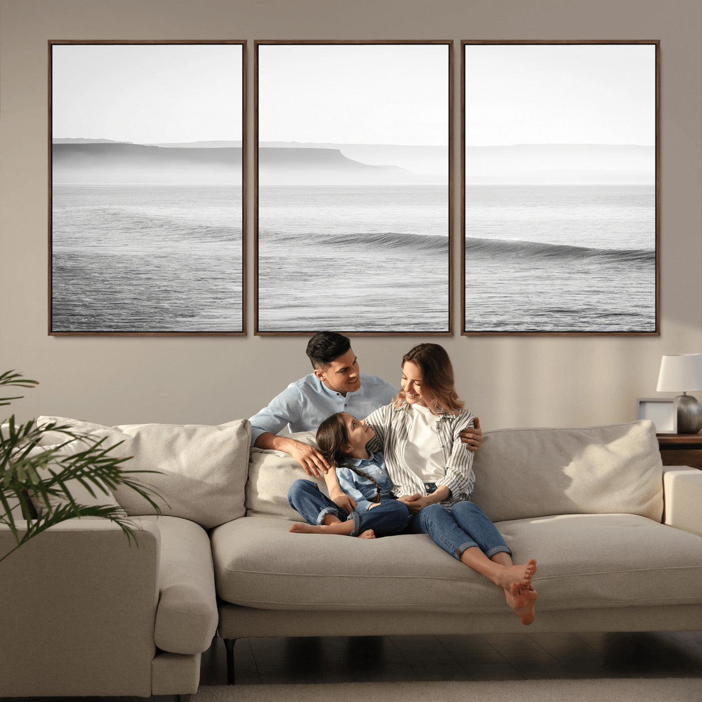 A black and white minimalist seascape featuring soft rolling waves and misty distant cliffs, creating a serene and timeless coastal atmosphere.