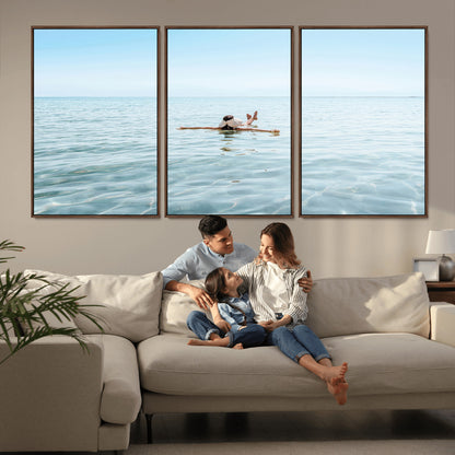 A peaceful minimalist scene of a person floating on crystal-clear water, surrounded by a vast open horizon, capturing relaxation and serenity in a tranquil aquatic setting.