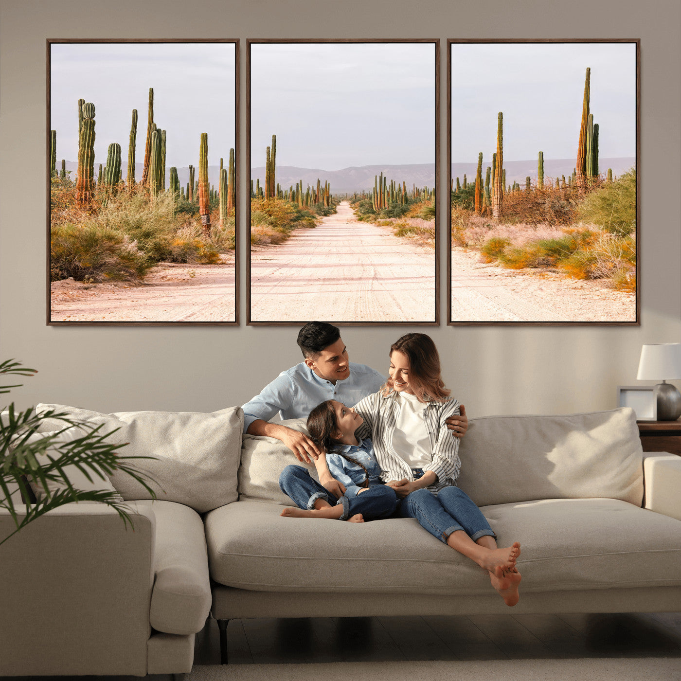 A desert road lined with saguaro cacti under a golden sky, creating a warm southwestern feel, perfect for boho or rustic decor.