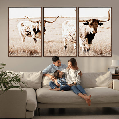 Two Texas longhorn cows standing in a sepia-toned pasture, evoking rustic charm perfect for farmhouse or western country interiors. (