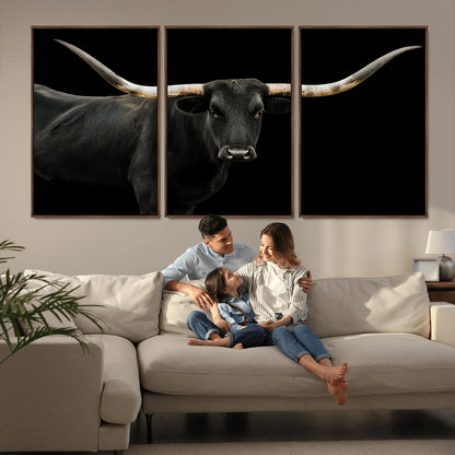 Close-up of a black Texas longhorn with large curved horns on black background, ideal for rustic farmhouse or modern western interiors.