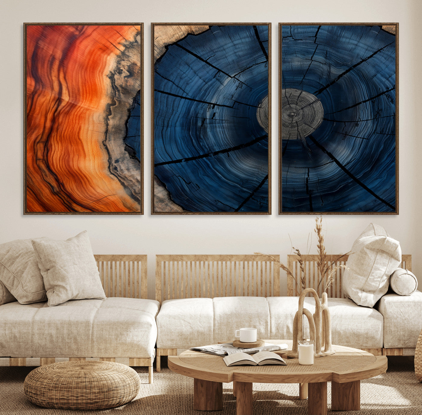 A captivating close-up of a tree trunk, showcasing its concentric rings in rich shades of blue, orange, and brown, highlighting the organic patterns of natural wood.